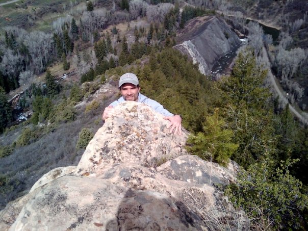 Tory Bjorklund clinging to a rock edge in Colorado, 2009